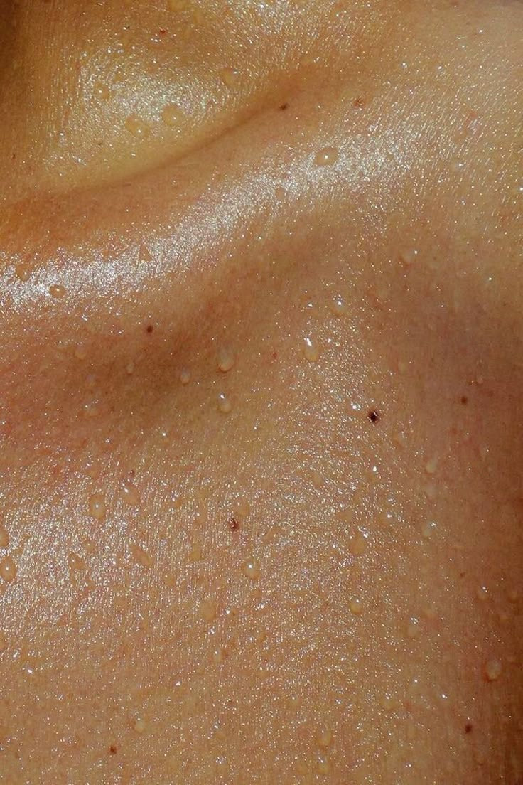Close-up of skin beaded with water